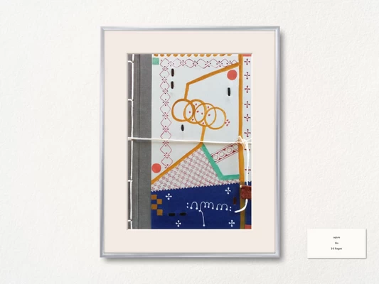 Ilo - handmade book presented in a picture frame.